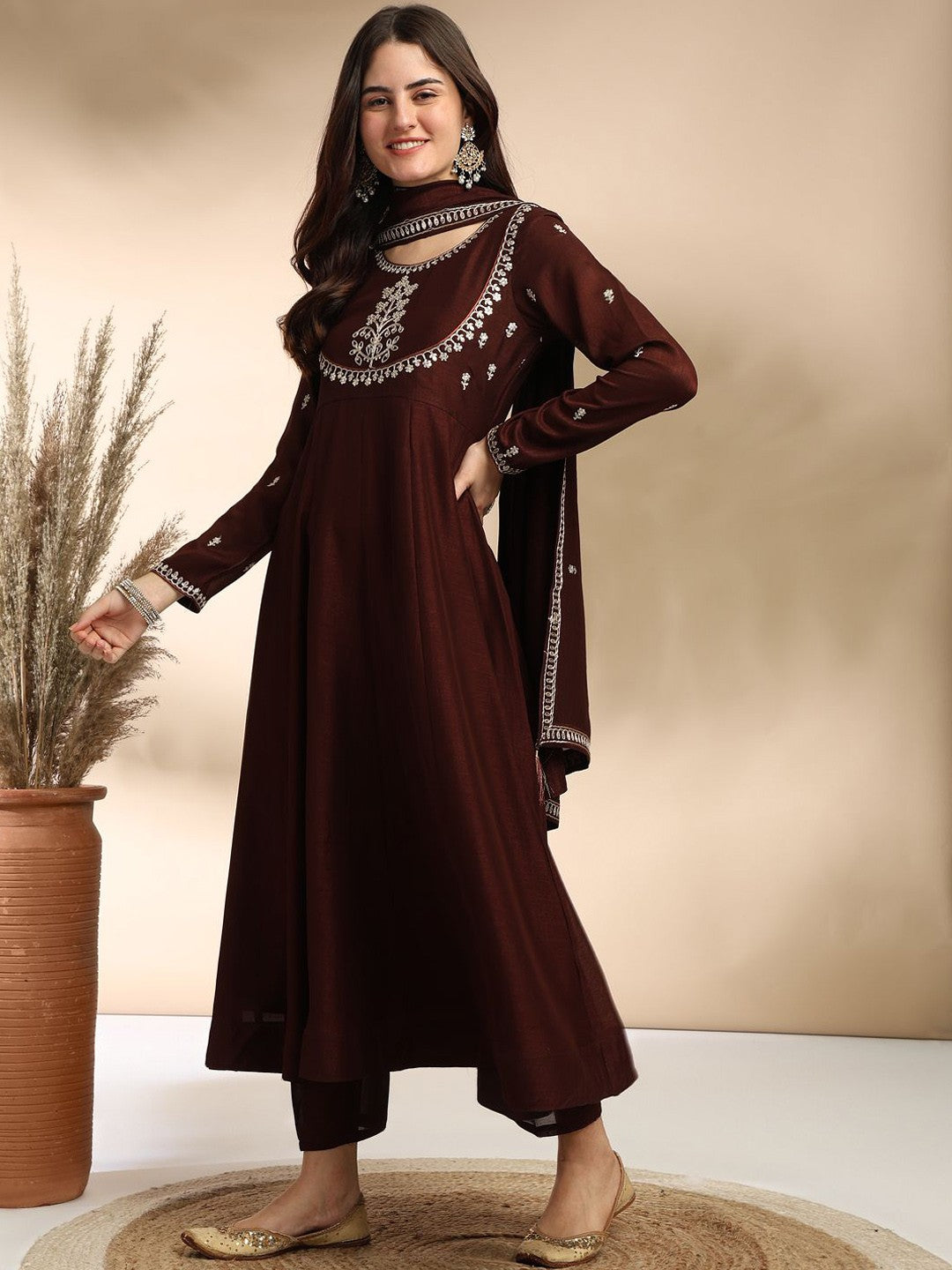 Elevate your wardrobe with this elegant maroon kurti set, adorned with delicate embroidery and a graceful silhouette