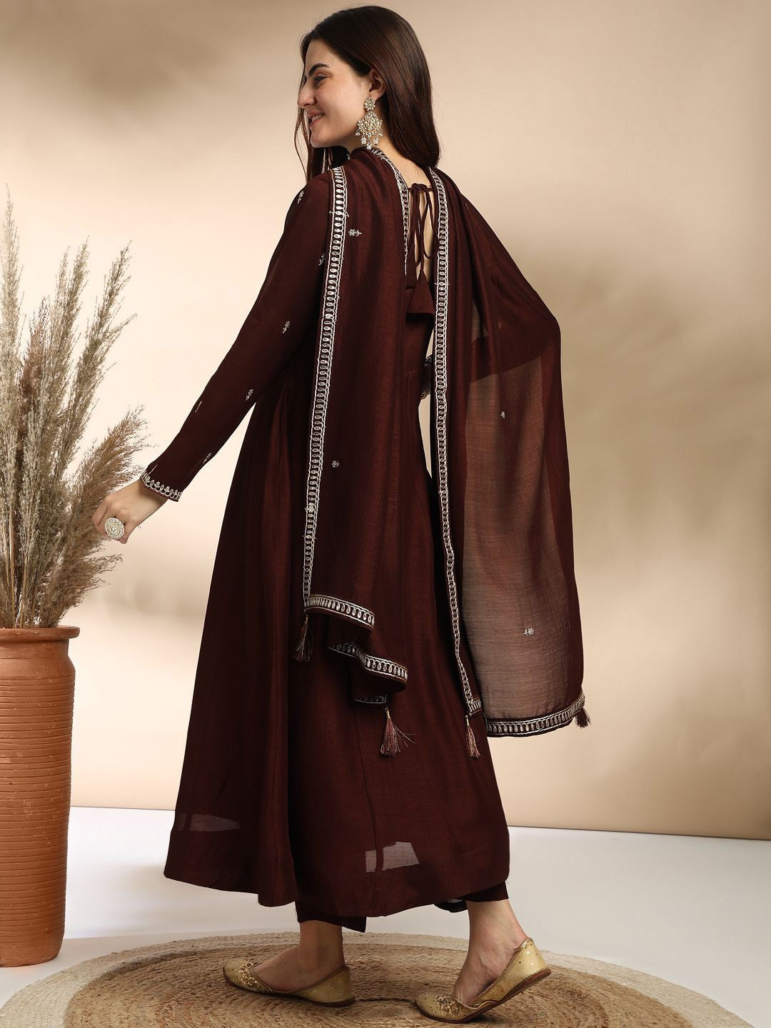 Elevate your wardrobe with this elegant maroon kurti set, adorned with delicate embroidery and a graceful silhouette