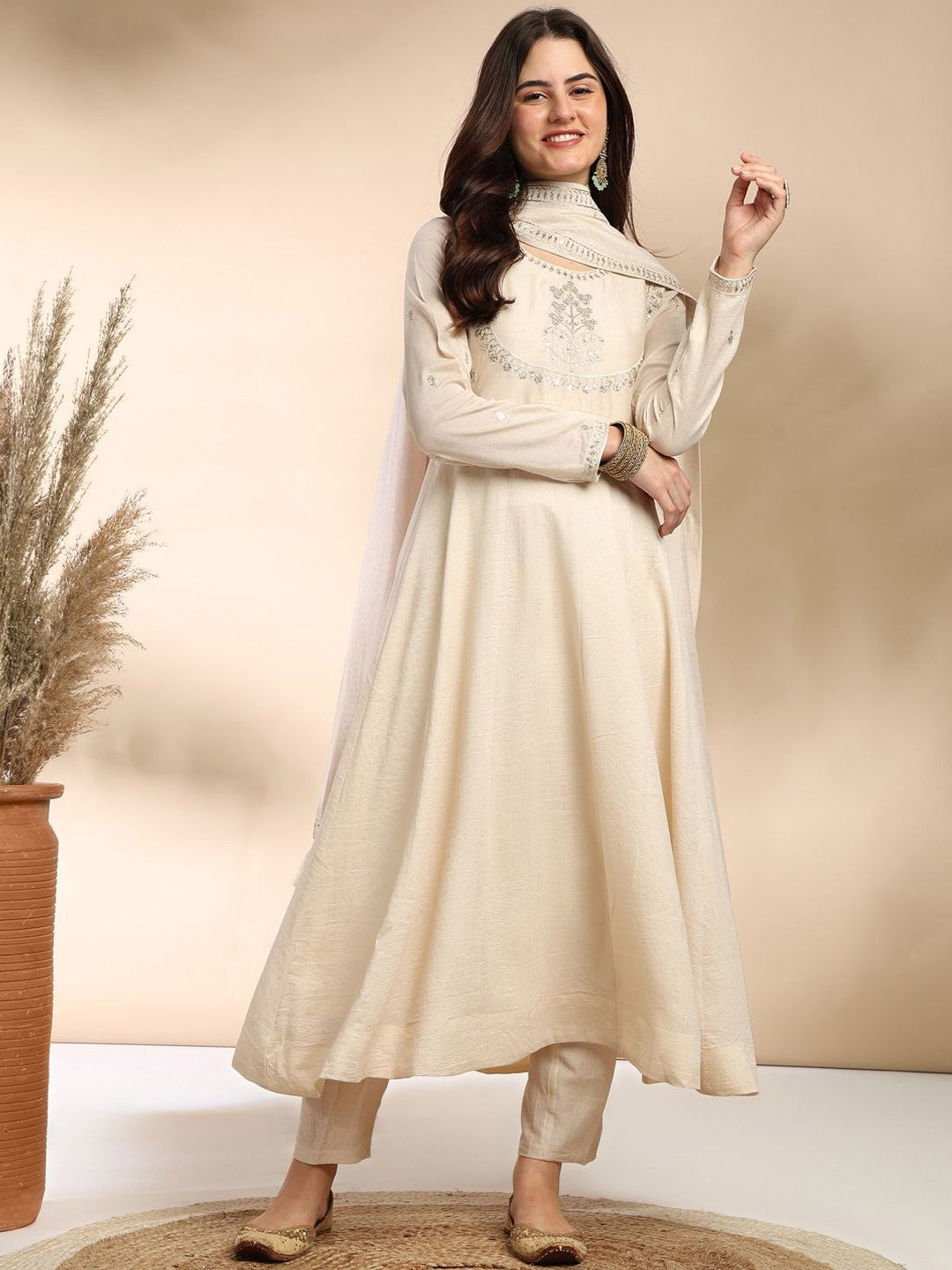 Elevate your wardrobe with this elegant maroon kurti set, adorned with delicate embroidery and a graceful silhouette