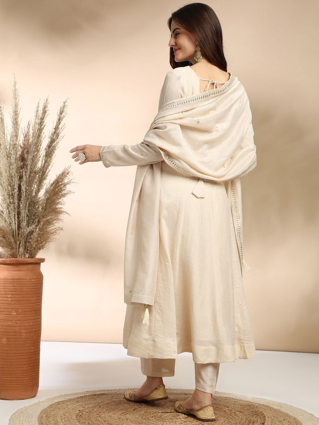 Elevate your wardrobe with this elegant maroon kurti set, adorned with delicate embroidery and a graceful silhouette