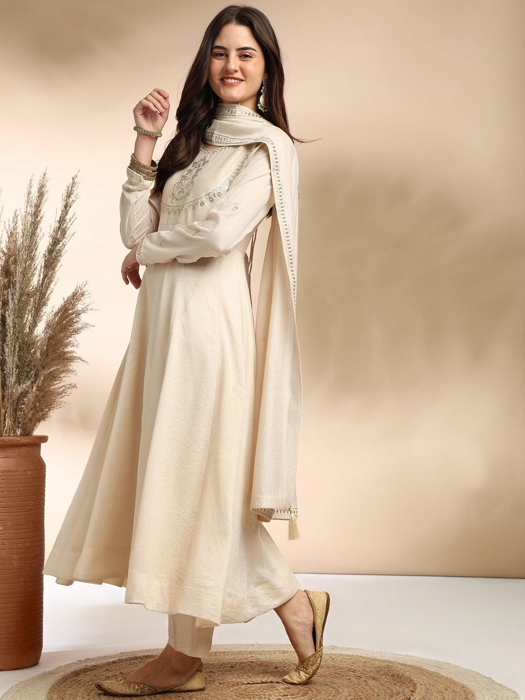 Elevate your wardrobe with this elegant maroon kurti set, adorned with delicate embroidery and a graceful silhouette