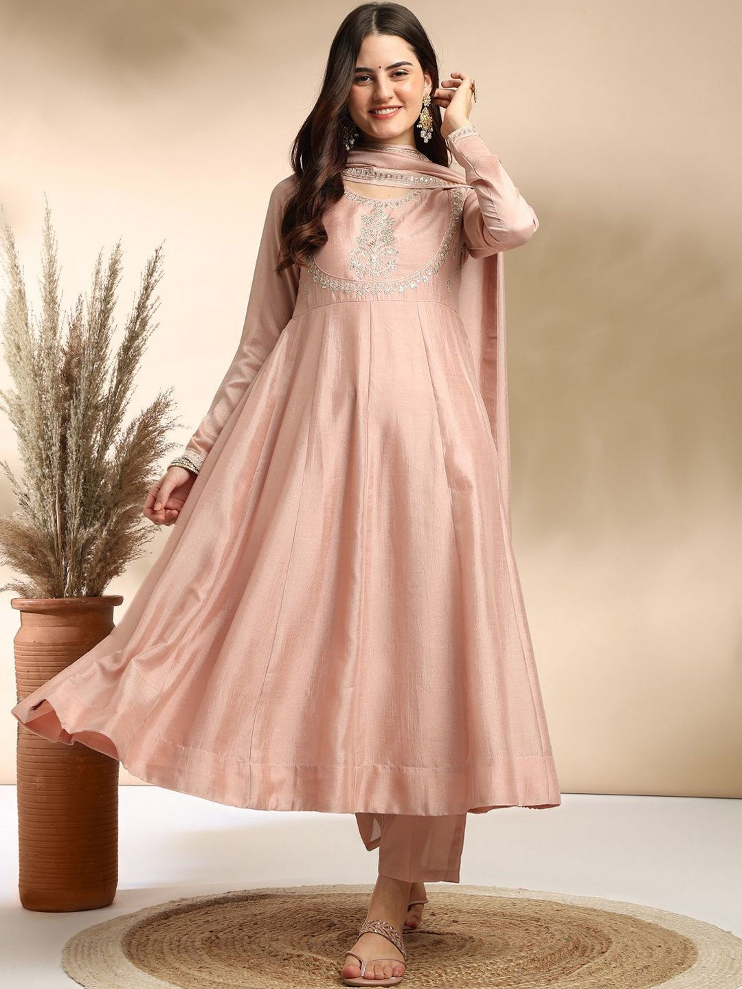 Elevate your wardrobe with this elegant maroon kurti set, adorned with delicate embroidery and a graceful silhouette