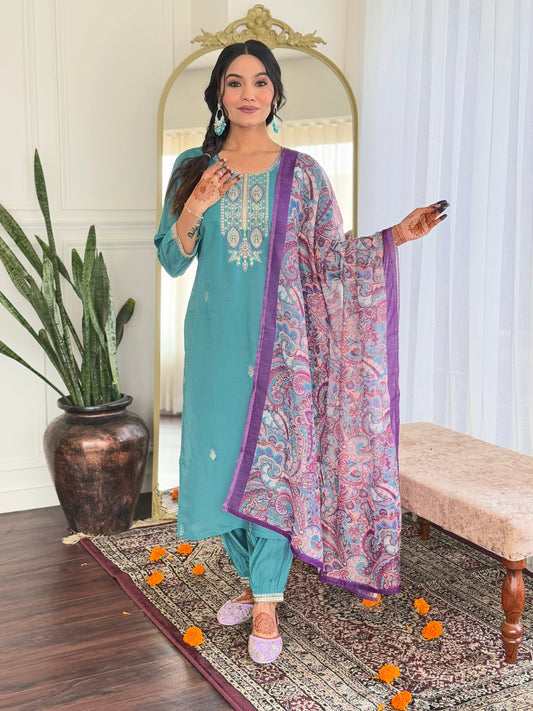 Embrace elegance with this serene teal kurti set, featuring intricate embroidery and a beautifully printed dupatta