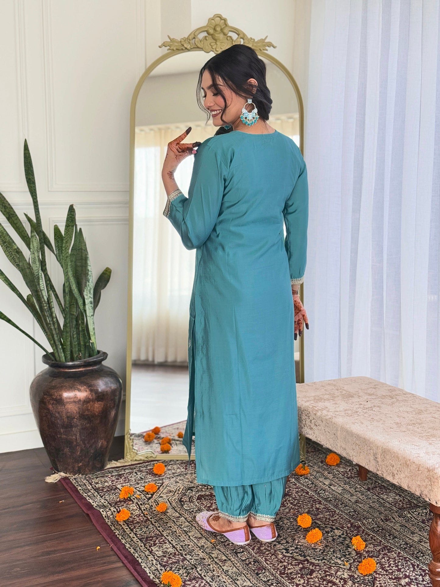 Embrace elegance with this serene teal kurti set, featuring intricate embroidery and a beautifully printed dupatta