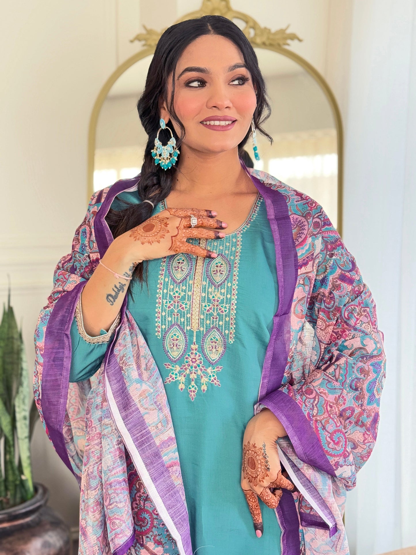 Embrace elegance with this serene teal kurti set, featuring intricate embroidery and a beautifully printed dupatta