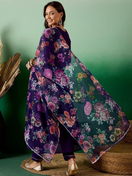 Elevate your style with this stunning deep purple Anarkali kurti set. Featuring intricate embroidery, delicate mirror work