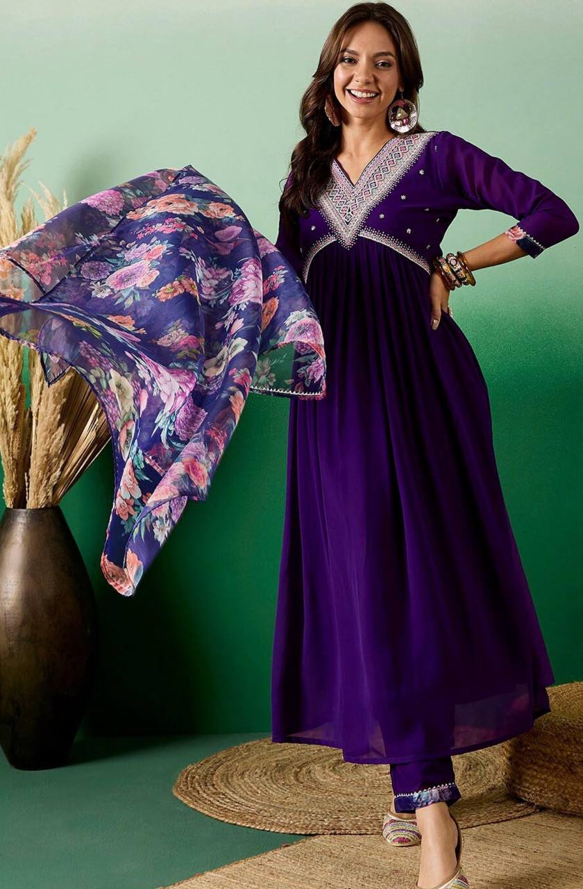 Elevate your style with this stunning deep purple Anarkali kurti set. Featuring intricate embroidery, delicate mirror work
