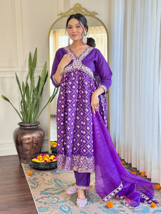 Elevate your style with this regal purple kurti set, adorned with intricate embroidery and traditional motifs