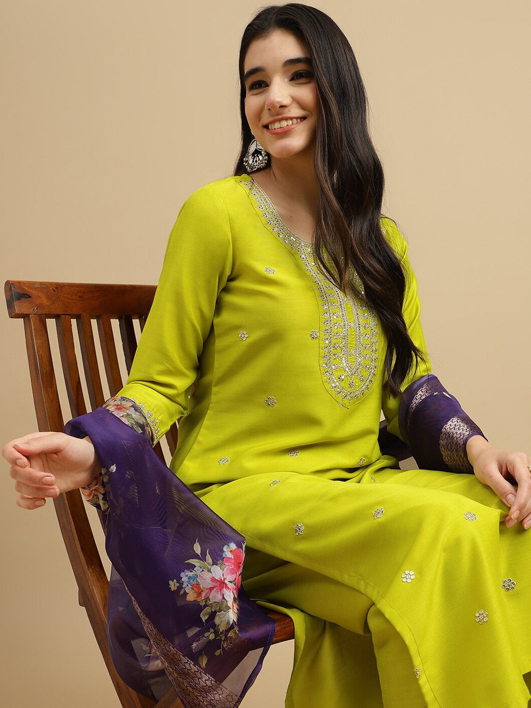 Brighten up your wardrobe with this stunning lime-green kurti set! Featuring delicate embellishments and a contrasting floral dupatta
