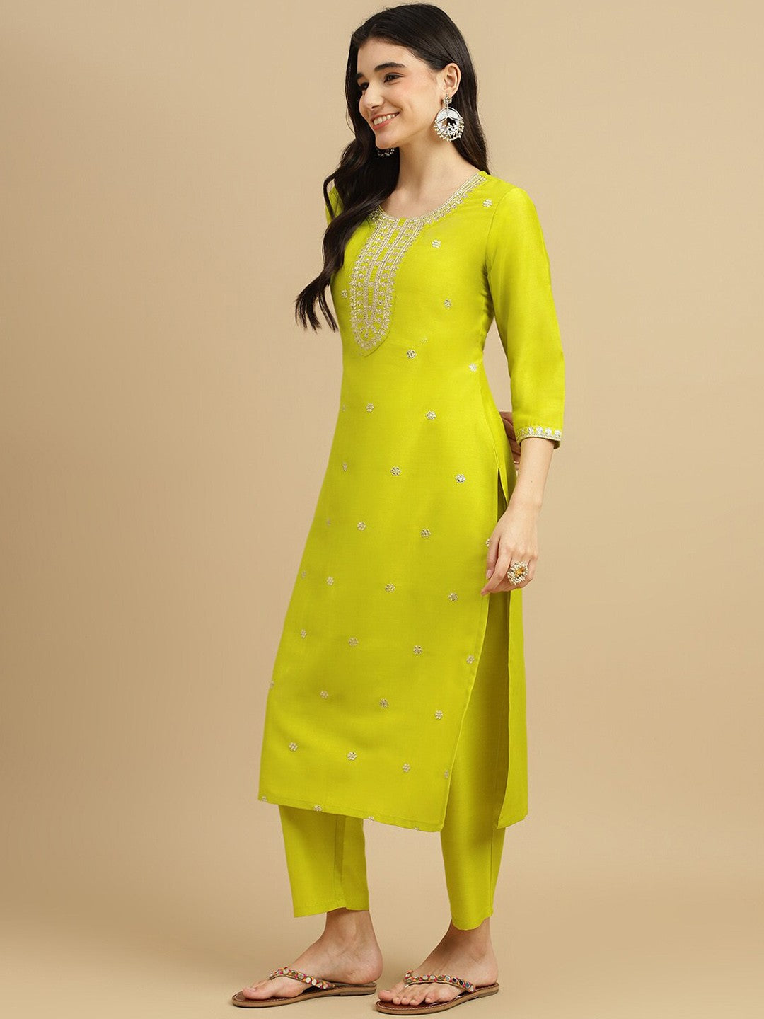 Brighten up your wardrobe with this stunning lime-green kurti set! Featuring delicate embellishments and a contrasting floral dupatta