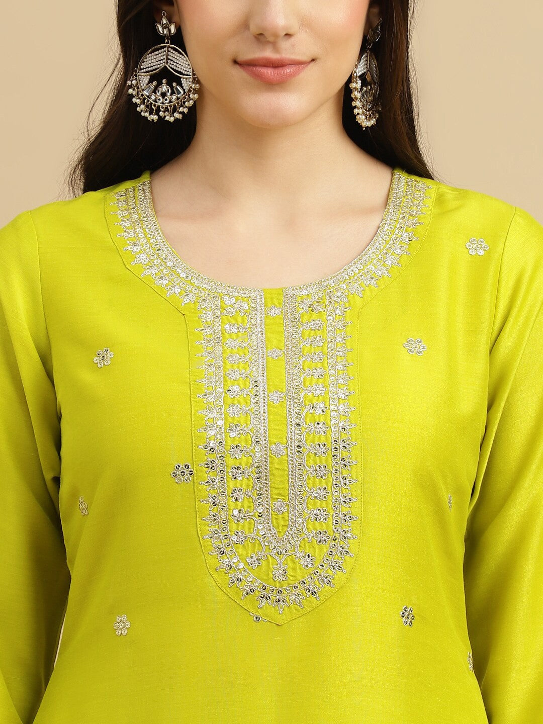 Brighten up your wardrobe with this stunning lime-green kurti set! Featuring delicate embellishments and a contrasting floral dupatta