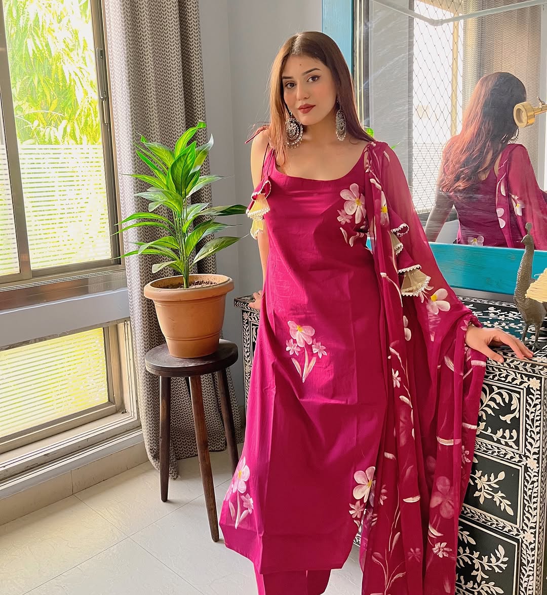 Radiate charm with this vibrant purple kurti set, beautifully adorned with delicate floral prints. The flowy silhouette, paired with a matching dupatta