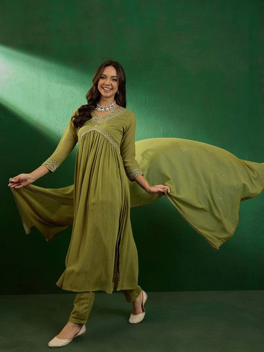 Flowy and elegant, this olive-green kurti set is a blend of comfort and style. Designed with delicate embroidery and paired with a lightweight dupatta