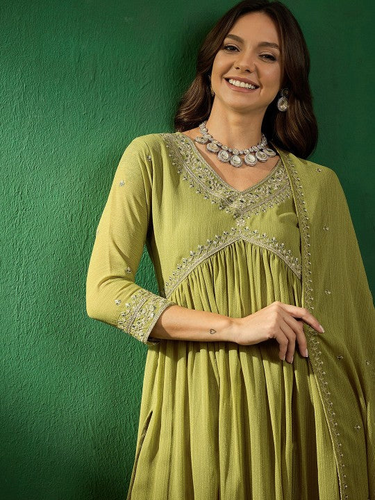 Flowy and elegant, this olive-green kurti set is a blend of comfort and style. Designed with delicate embroidery and paired with a lightweight dupatta