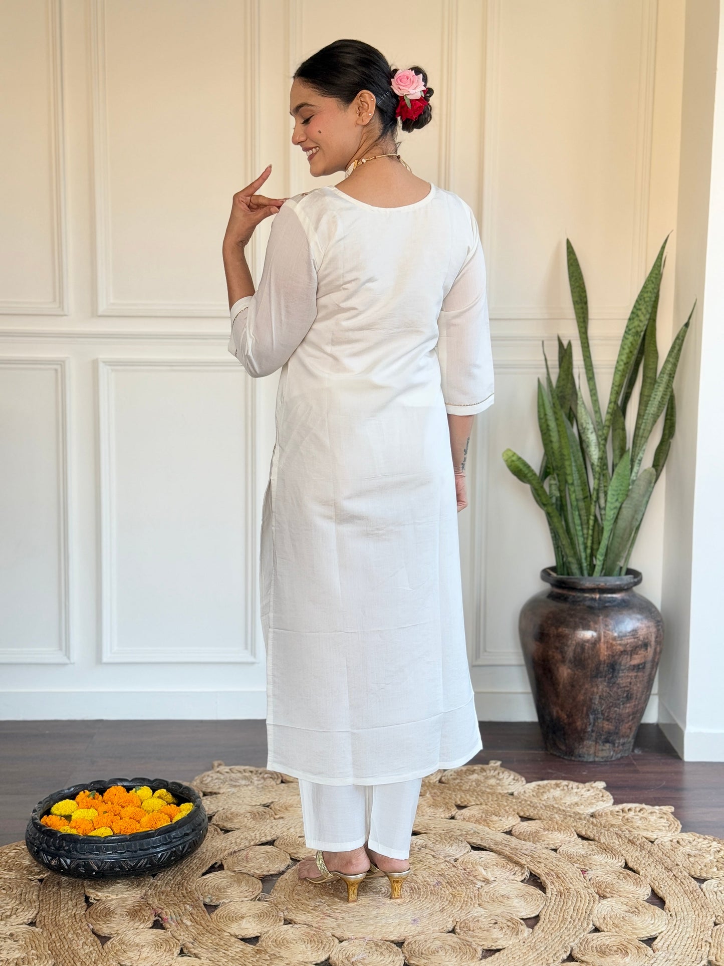 Embrace elegance with this serene white kurti set, adorned with delicate pastel embroidery and a floral-printed blue dupatta