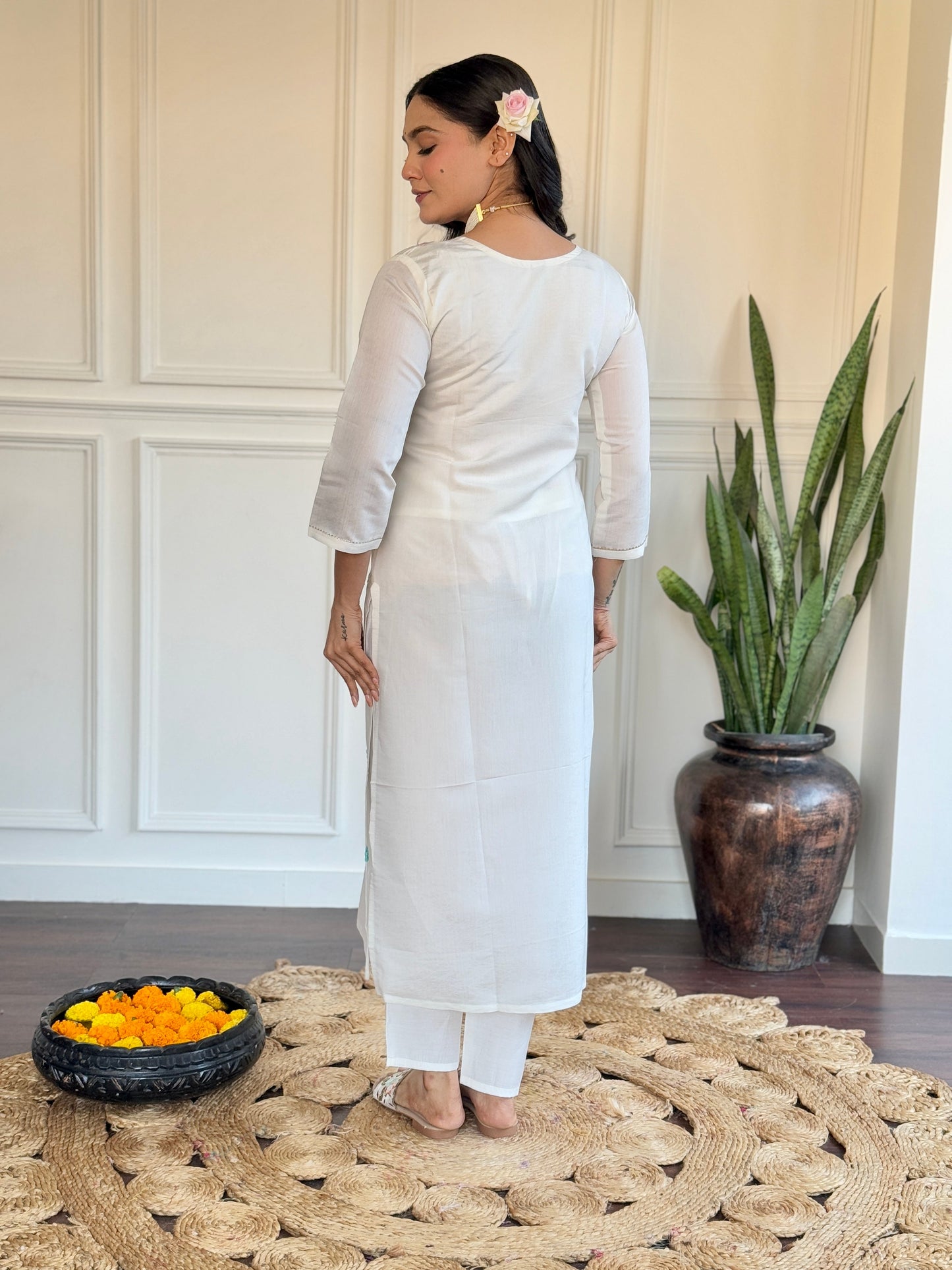 Embrace elegance with this serene white kurti set, adorned with delicate pastel embroidery and a floral-printed blue dupatta