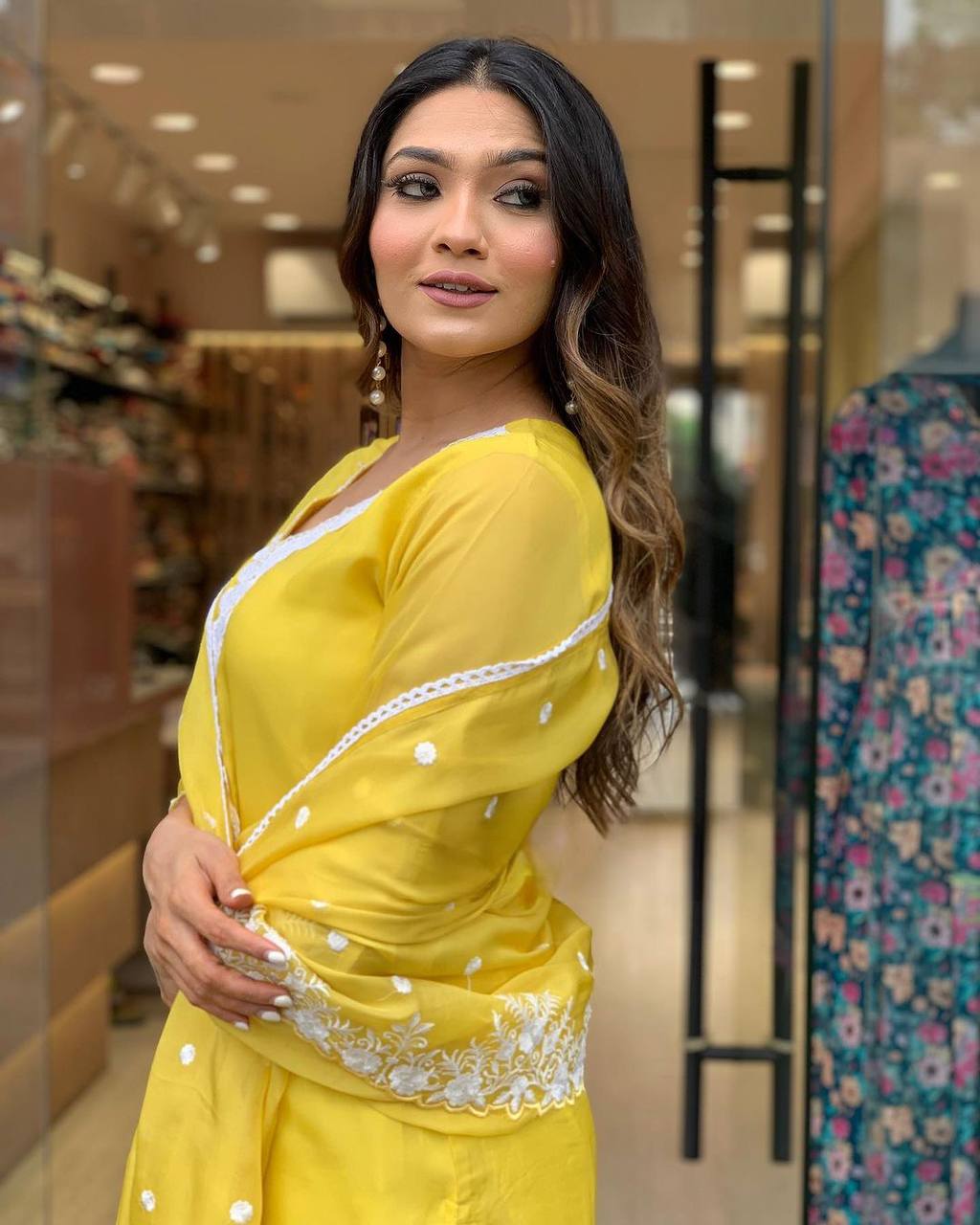 Radiate elegance in this vibrant yellow kurti set, adorned with delicate white embroidery and a beautifully crafted dupatta