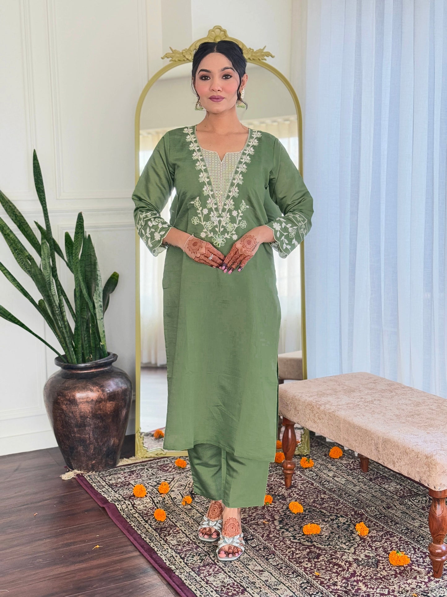 Embrace elegance with this sage green kurti set, beautifully adorned with delicate white embroidery. The soft fabric and intricate detailing make it perfect for any occasion