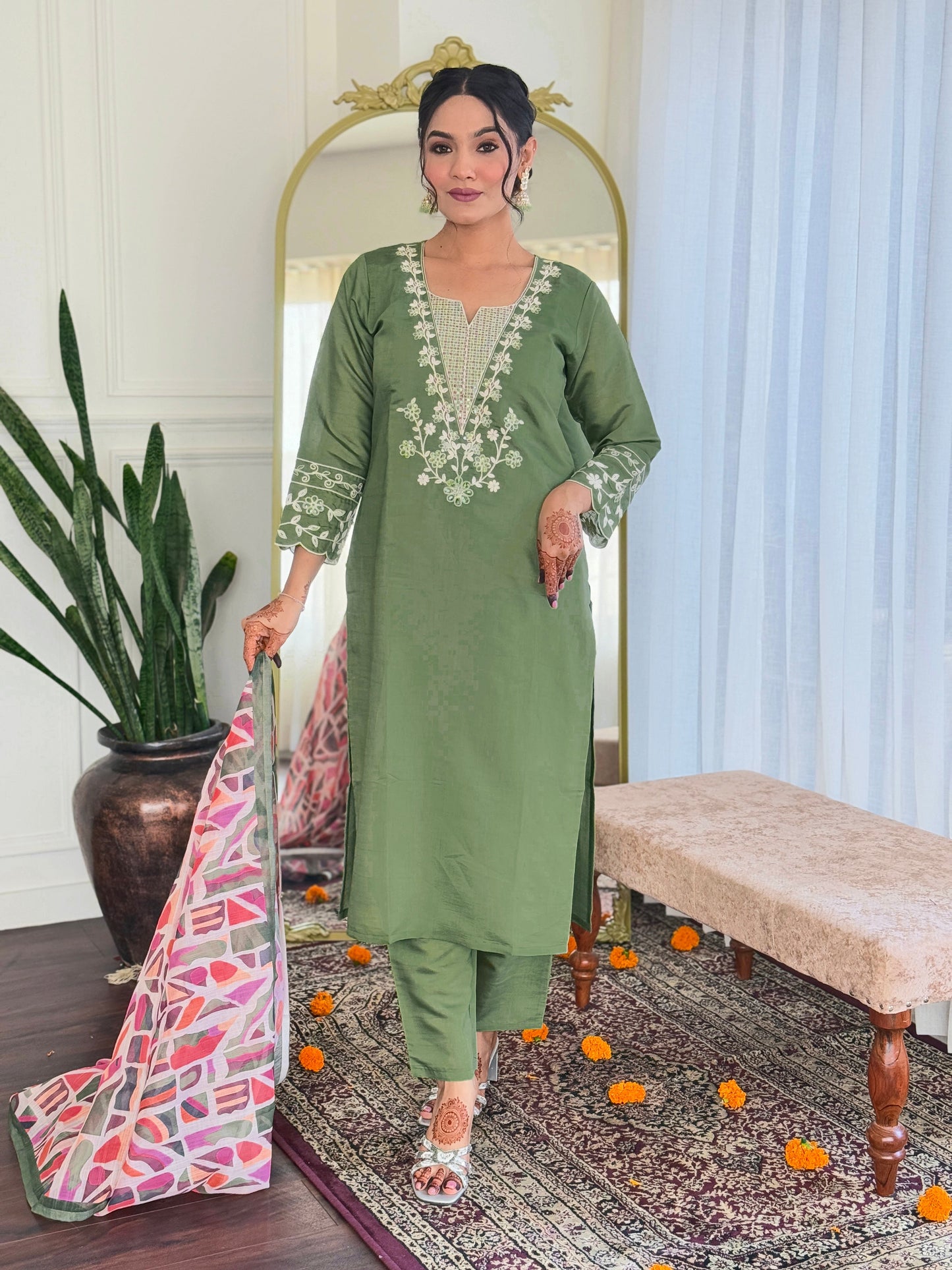 Embrace elegance with this sage green kurti set, beautifully adorned with delicate white embroidery. The soft fabric and intricate detailing make it perfect for any occasion