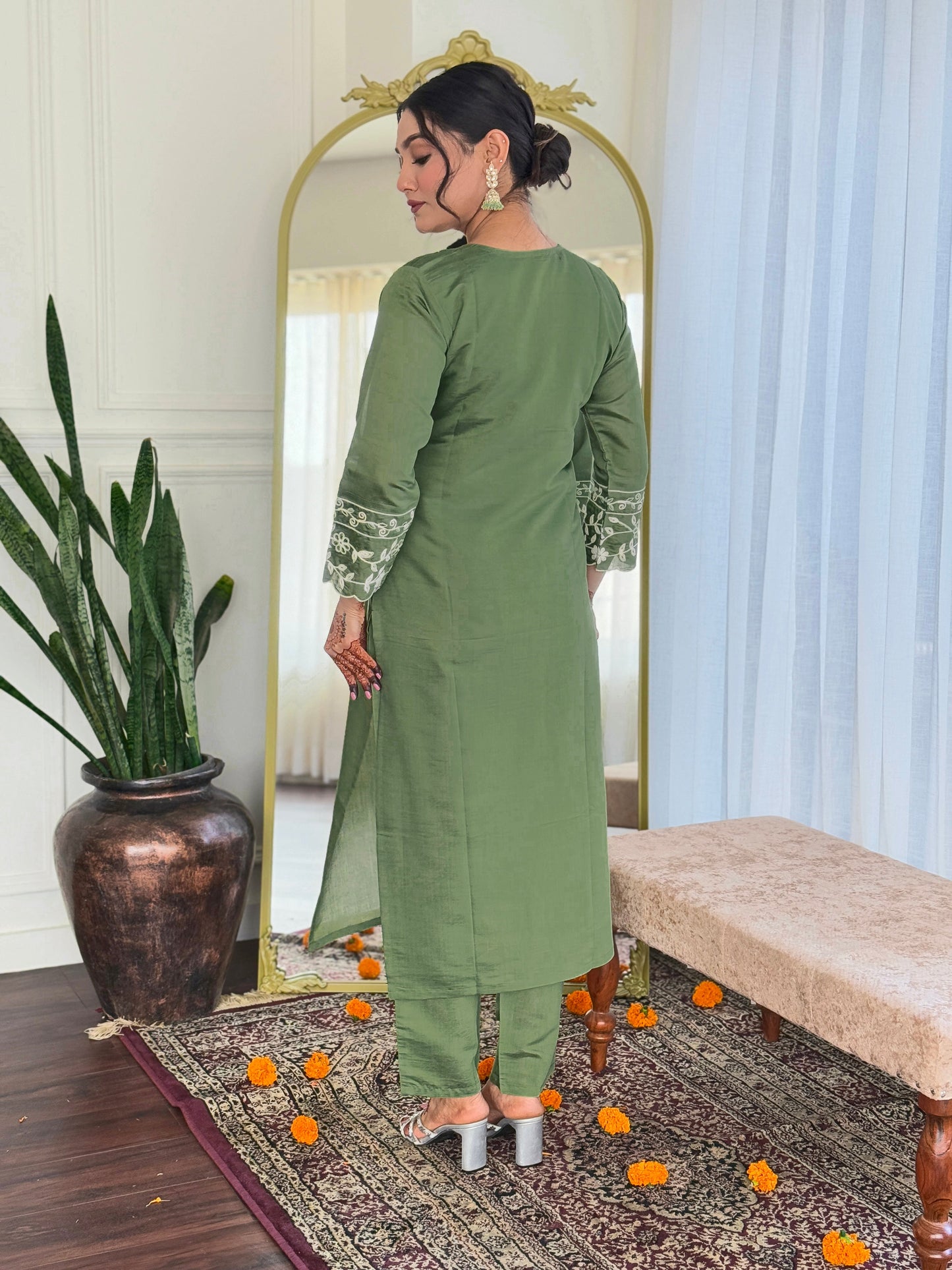 Embrace elegance with this sage green kurti set, beautifully adorned with delicate white embroidery. The soft fabric and intricate detailing make it perfect for any occasion