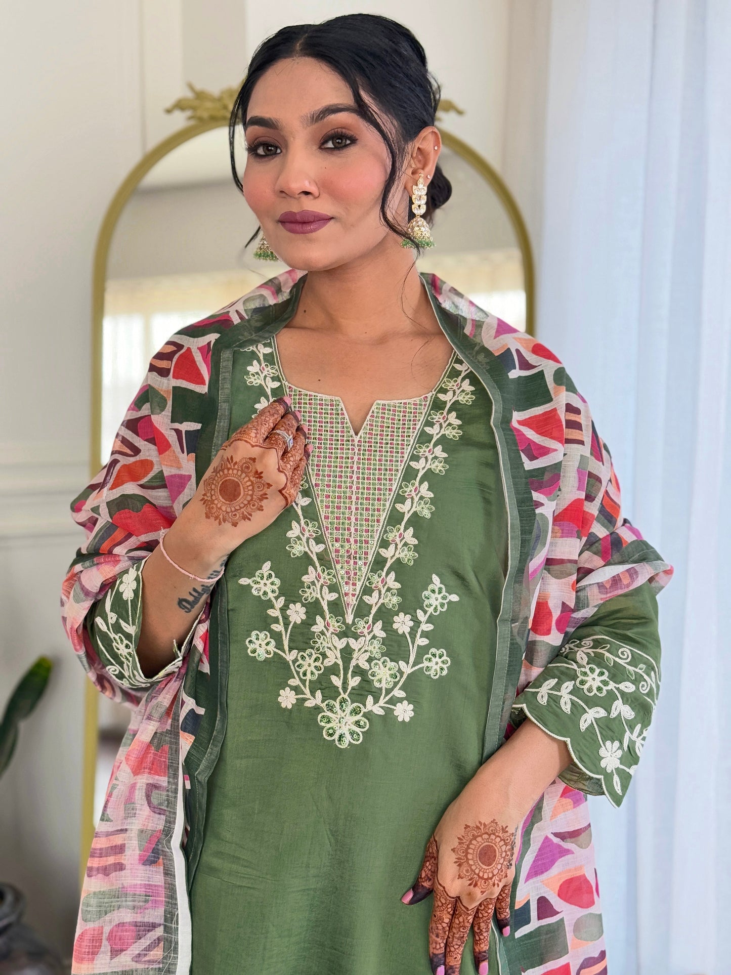 Embrace elegance with this sage green kurti set, beautifully adorned with delicate white embroidery. The soft fabric and intricate detailing make it perfect for any occasion