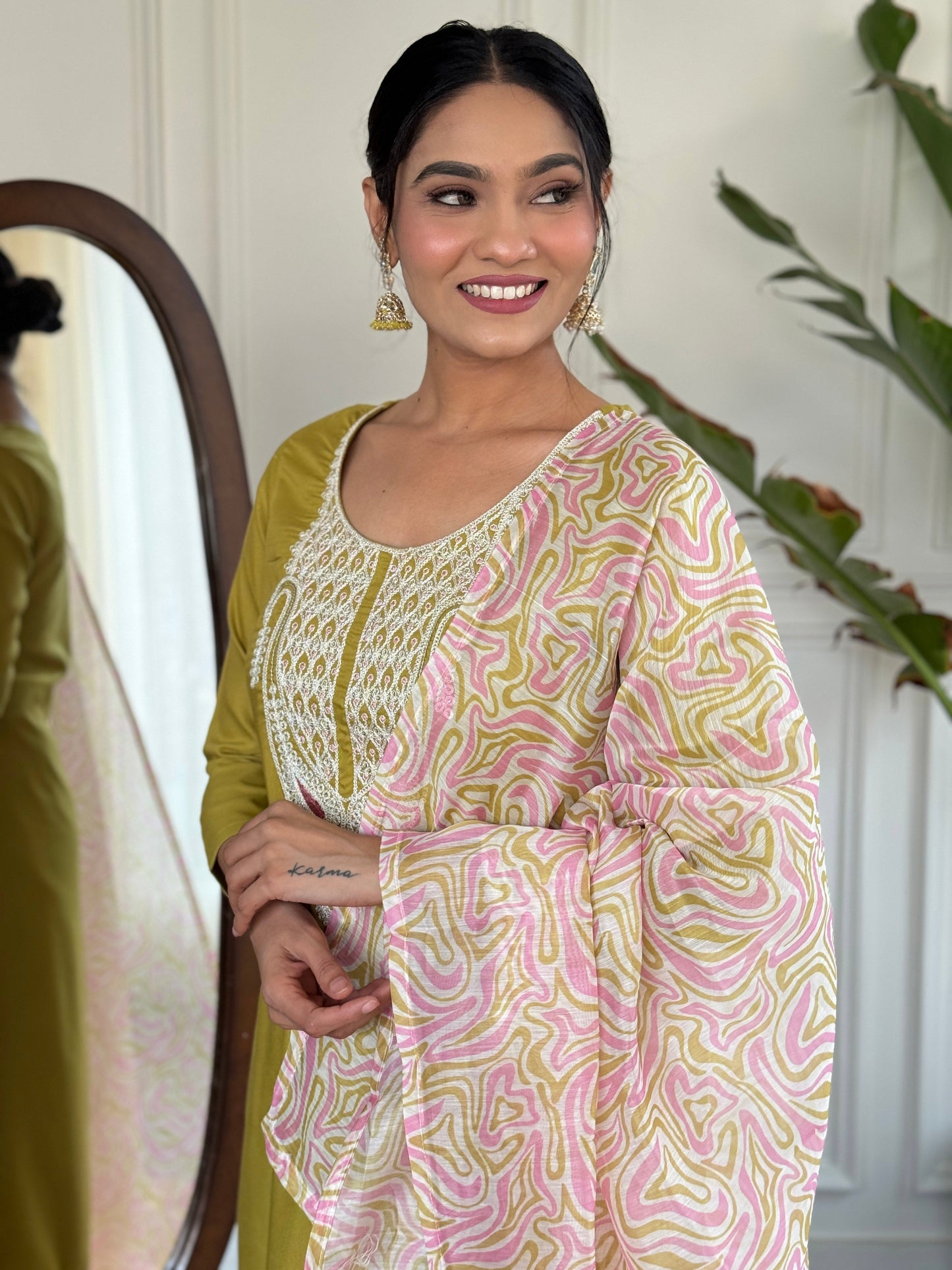 Elevate your style with this sophisticated navy blue kurti set, featuring intricate white embroidery on the neckline
