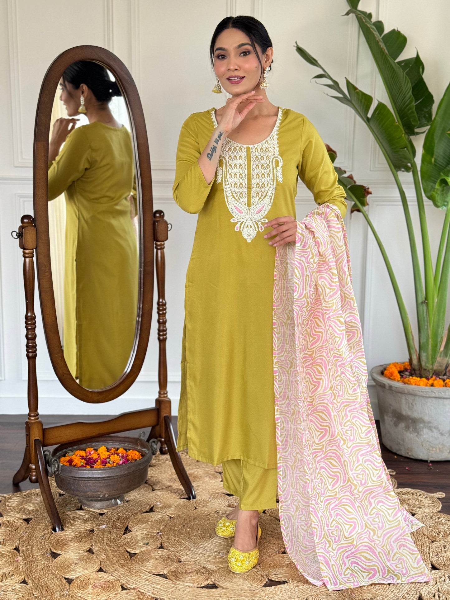 Elevate your style with this sophisticated navy blue kurti set, featuring intricate white embroidery on the neckline