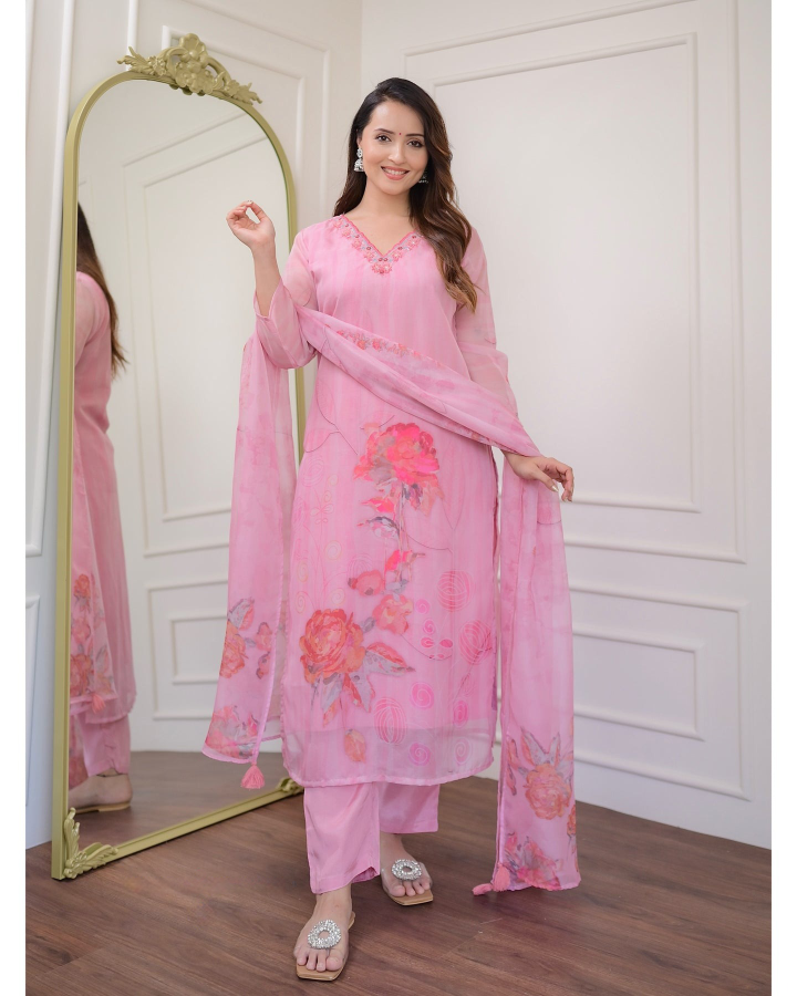 Embrace elegance with this gorgeous pink kurti set, featuring delicate embroidery and floral prints.