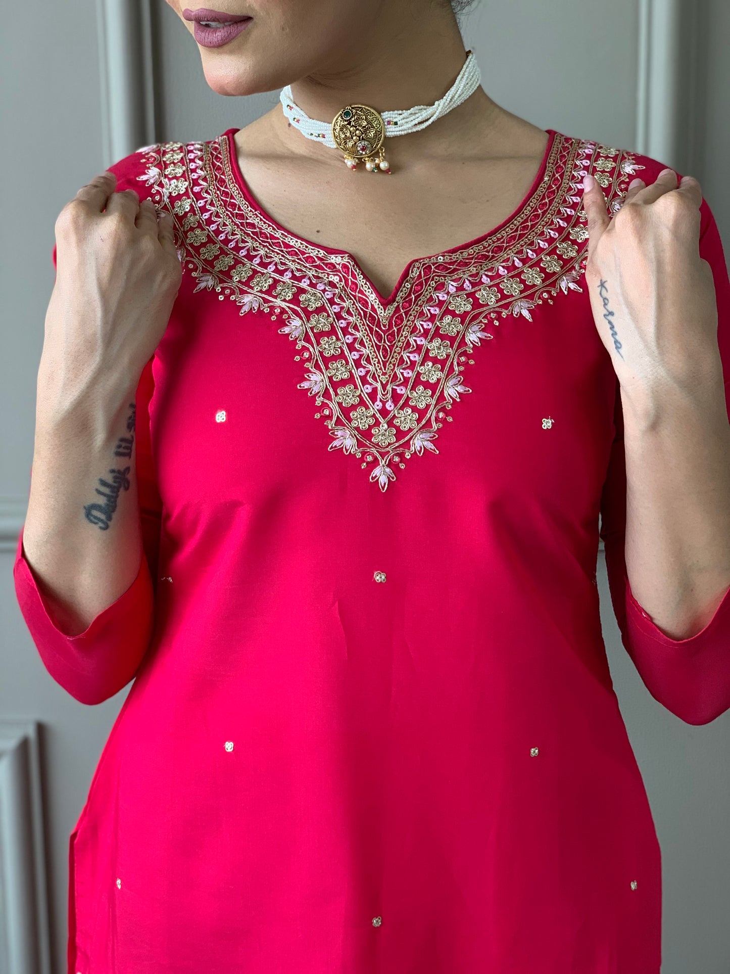 Drape yourself in elegance with this vibrant red kurti set, featuring exquisite embroidery and a rich Banarasi dupatta