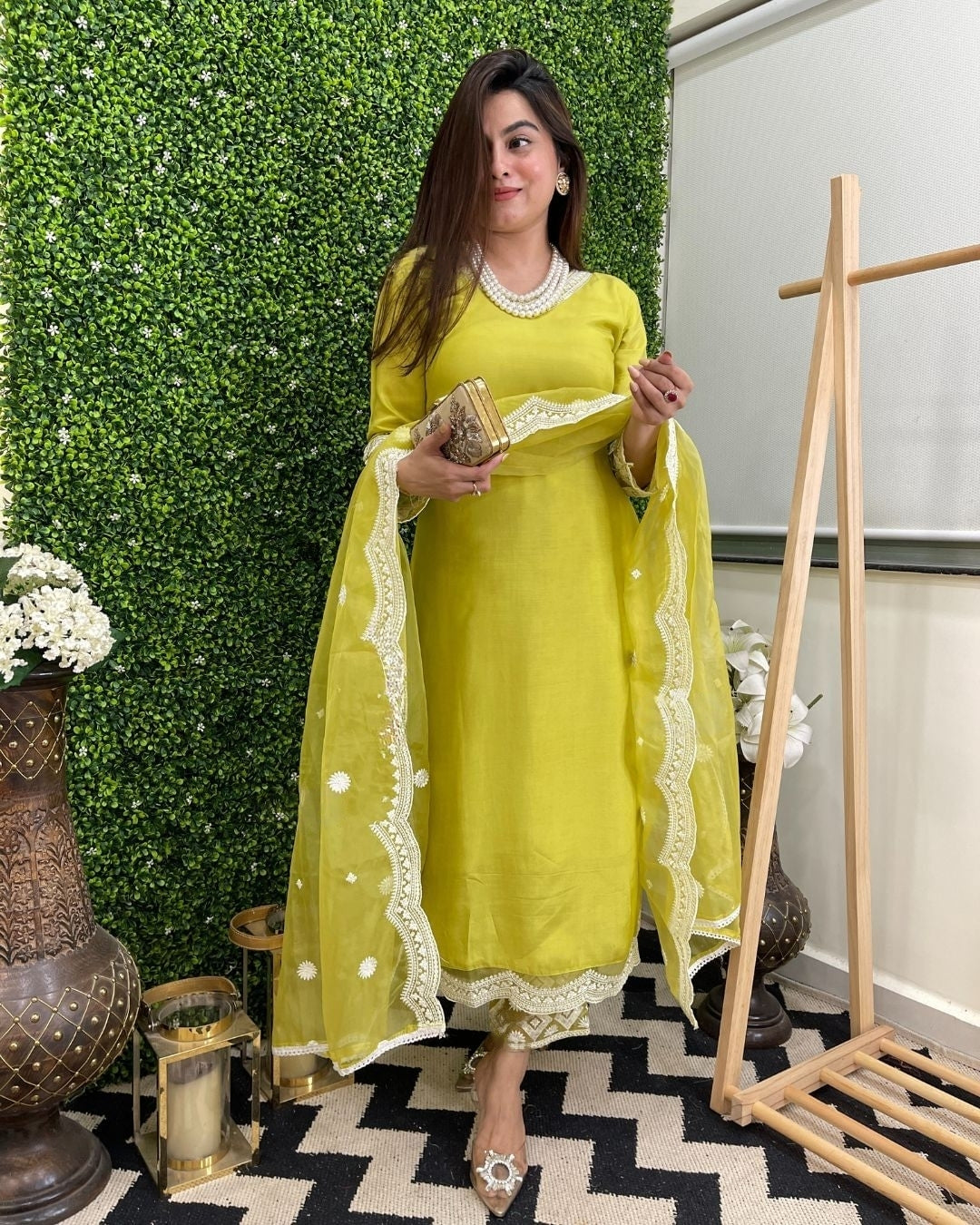Step into timeless elegance with this vibrant green kurti set, featuring intricate mirror work and a stunning bandhani dupatta