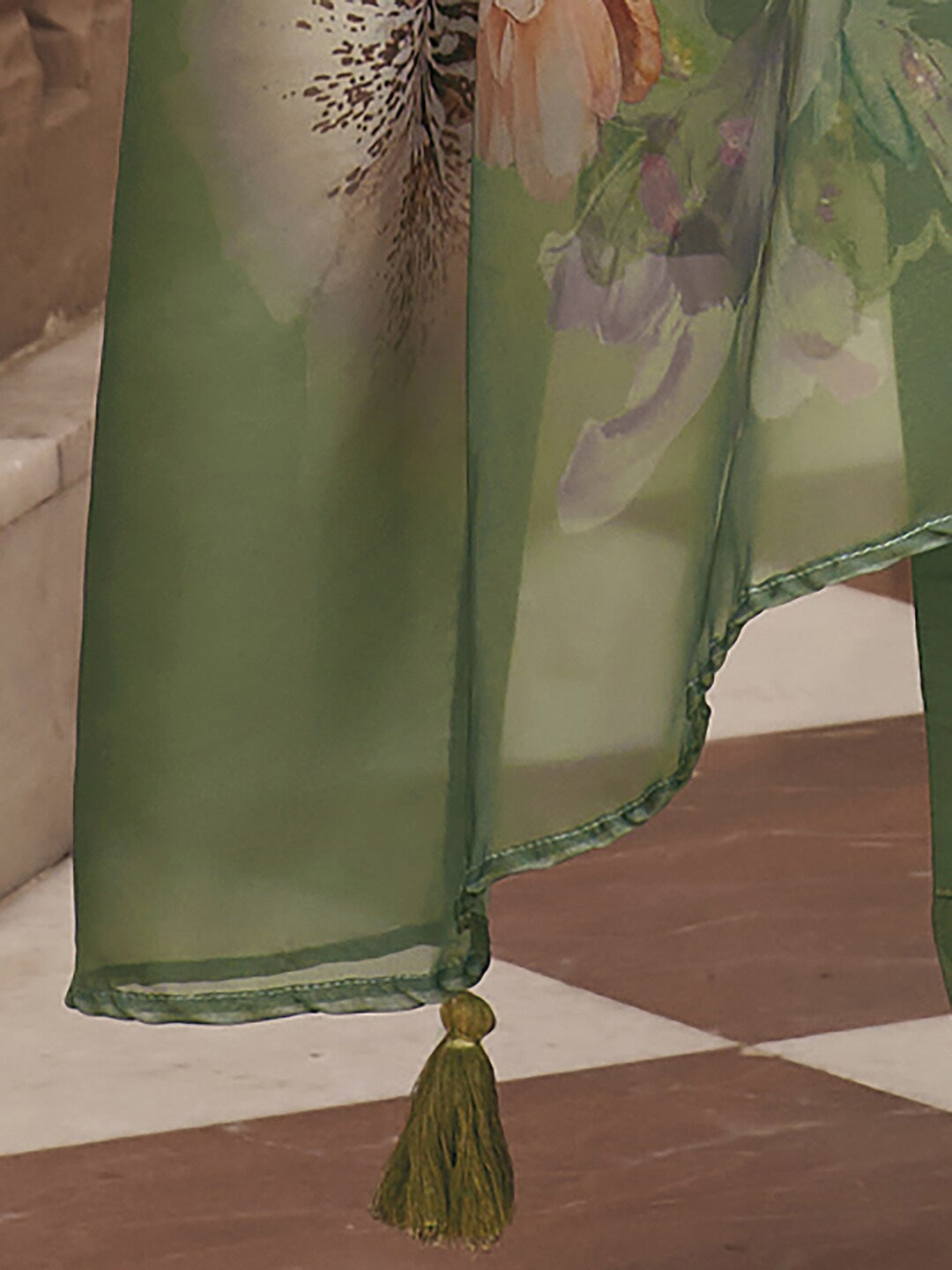 Embrace elegance with this enchanting green kurti set, adorned with delicate floral embroidery and a flowy printed dupatta. The intricate details add a touch of sophistication, making it perfect for festive and casual wear