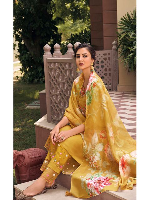 Embrace elegance with this enchanting green kurti set, adorned with delicate floral embroidery and a flowy printed dupatta. The intricate details add a touch of sophistication, making it perfect for festive and casual wear