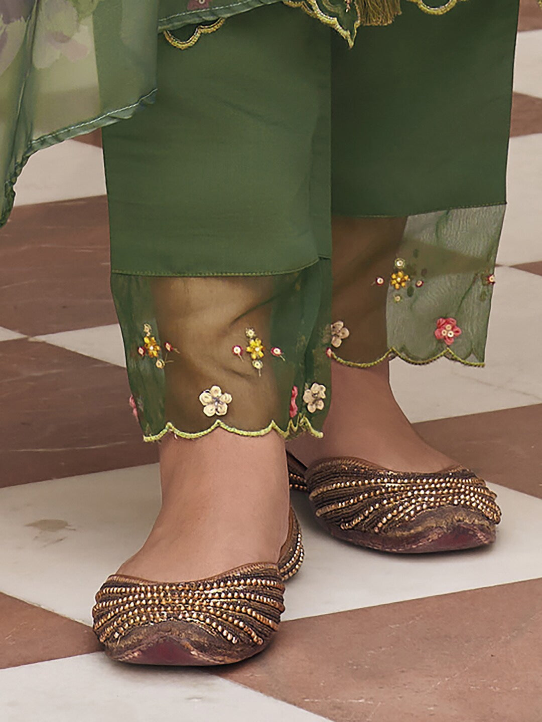 Embrace elegance with this enchanting green kurti set, adorned with delicate floral embroidery and a flowy printed dupatta. The intricate details add a touch of sophistication, making it perfect for festive and casual wear