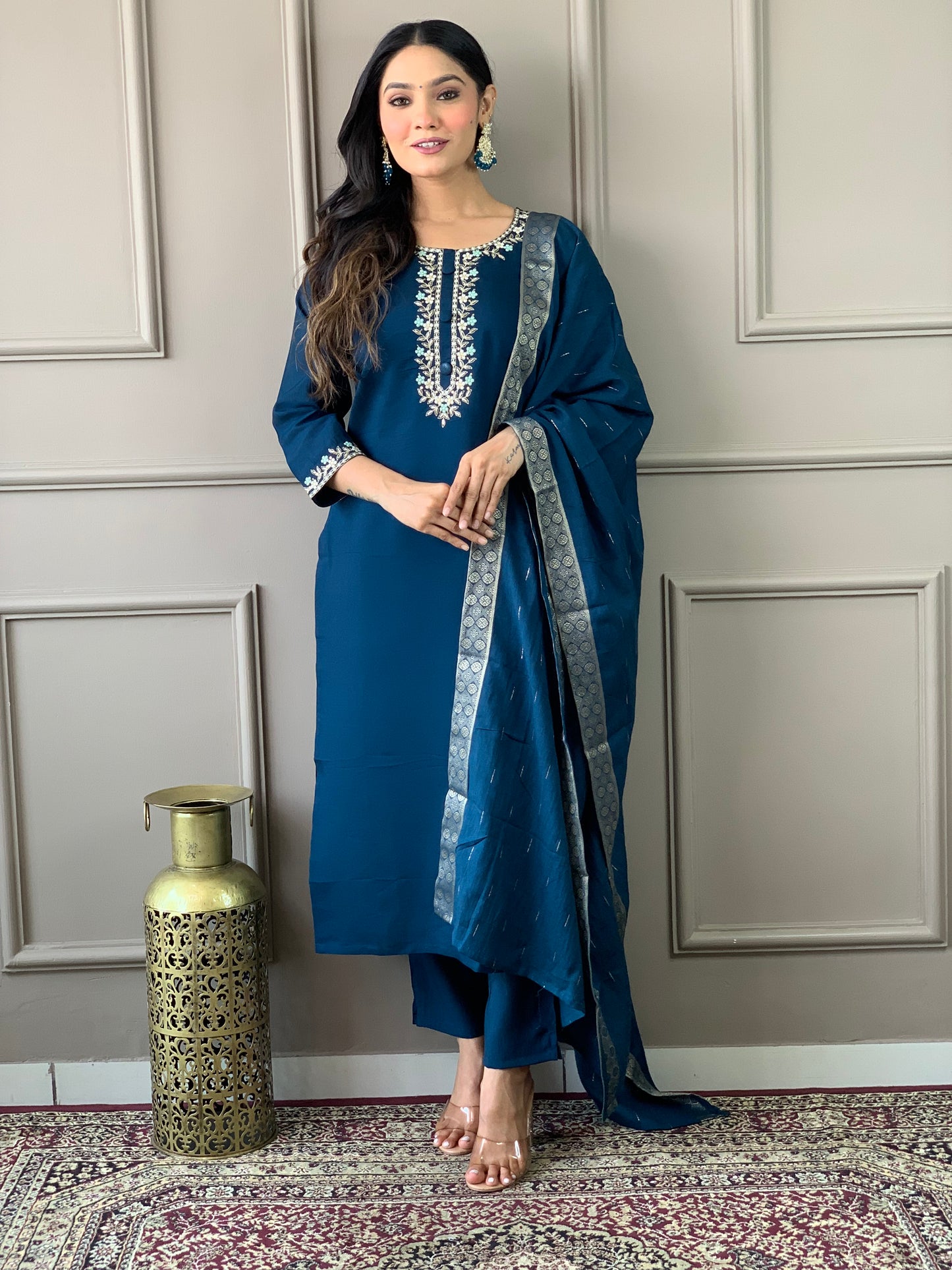 Elevate your style with this elegant blue kurti set, featuring intricate embroidery and a graceful dupatta. Perfect for festive occasions or casual elegance,