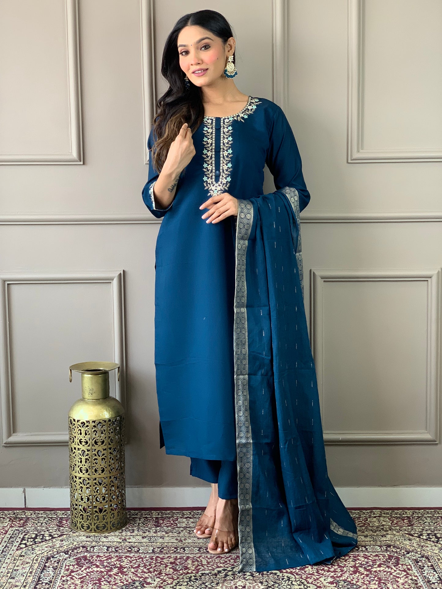Elevate your style with this elegant blue kurti set, featuring intricate embroidery and a graceful dupatta. Perfect for festive occasions or casual elegance,