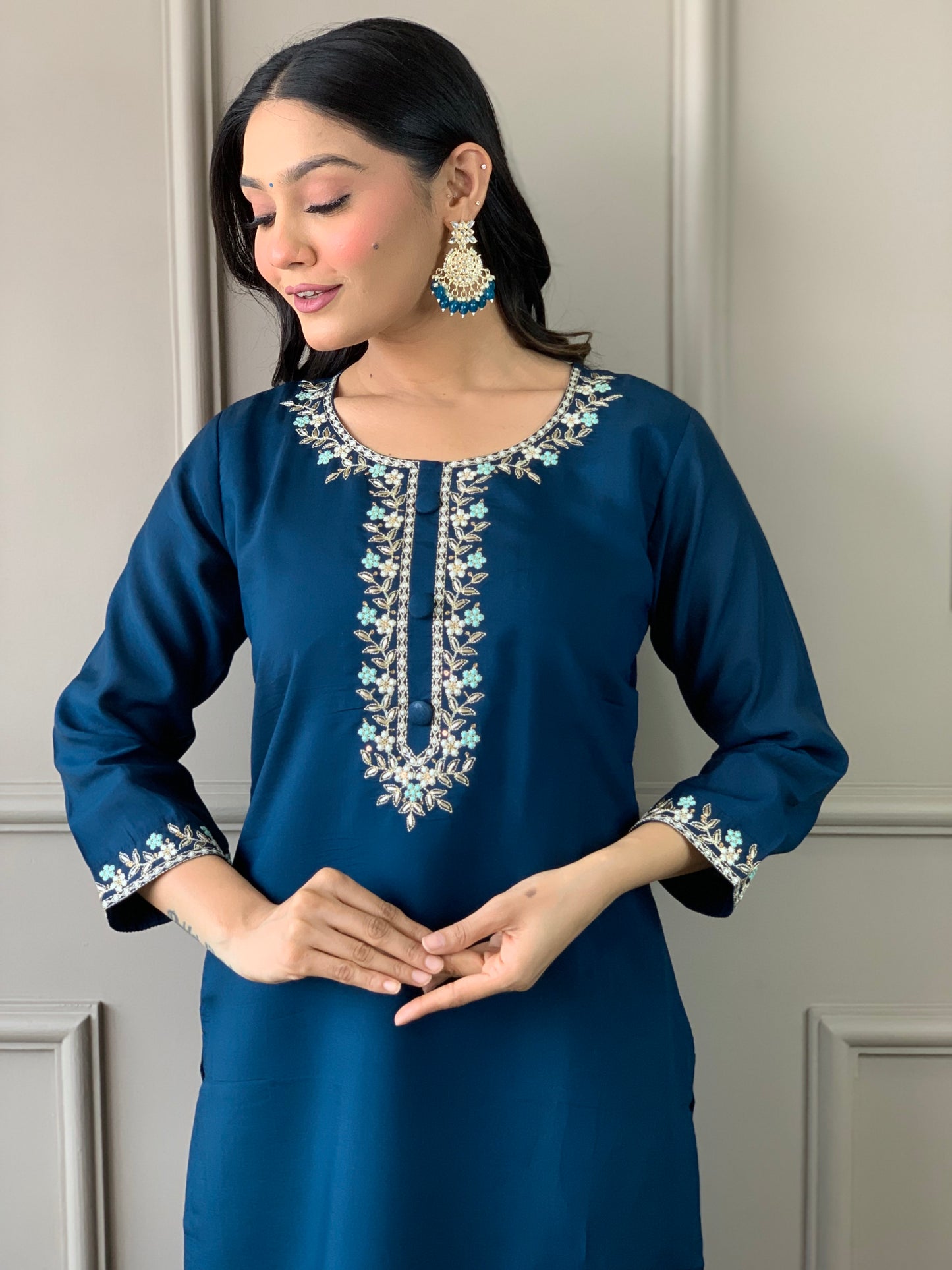 Elevate your style with this elegant blue kurti set, featuring intricate embroidery and a graceful dupatta. Perfect for festive occasions or casual elegance,