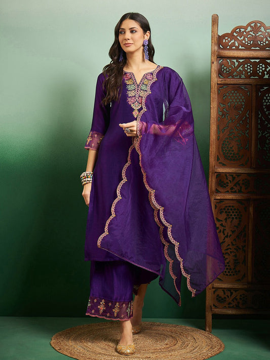 Elevate your style with this regal purple kurti set, adorned with intricate embroidery and delicate scalloped detailing