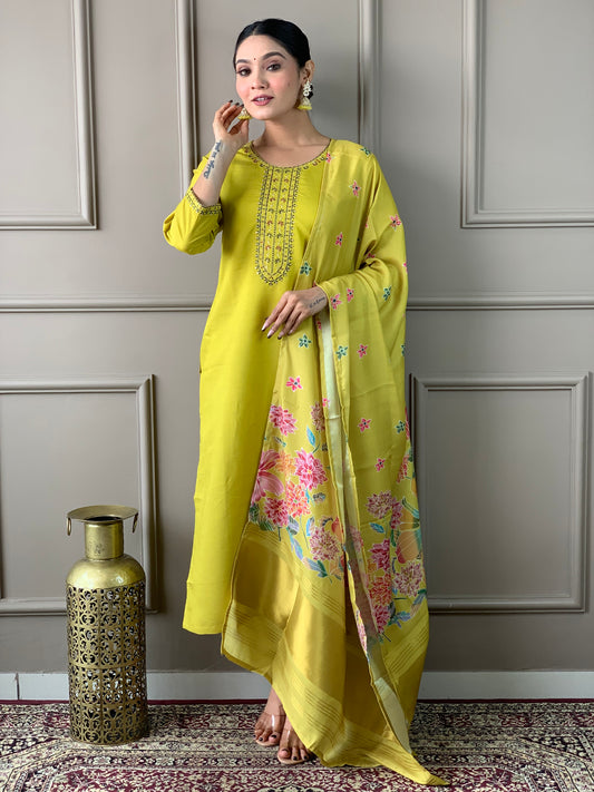 Brighten up your wardrobe with this elegant yellow kurti set, featuring delicate embroidery and a floral-printed dupatta