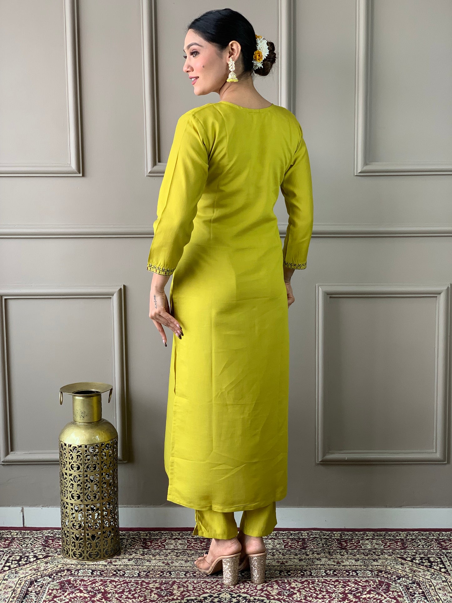 Brighten up your wardrobe with this elegant yellow kurti set, featuring delicate embroidery and a floral-printed dupatta