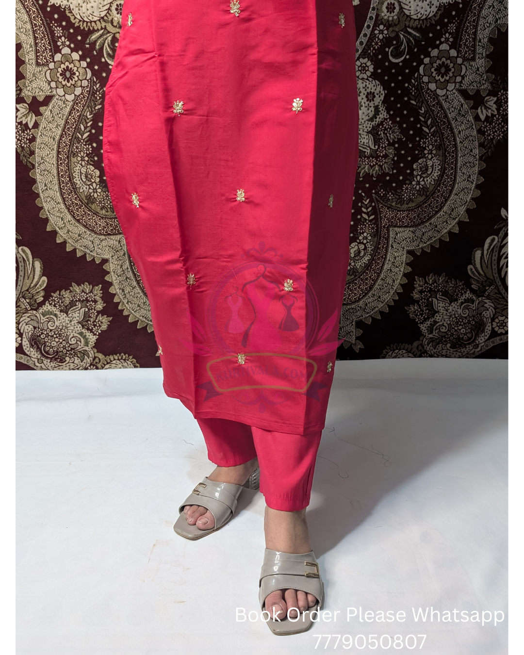 Radiate elegance in this stunning pink kurti set, adorned with delicate embroidery and paired with a regal zari-bordered dupatta