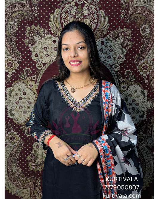 Elegant black kurti set adorned with intricate embroidery and a stylish printed dupatta. Perfect for festive occasions and casual gatherings, offering a blend of traditional charm and modern sophistication