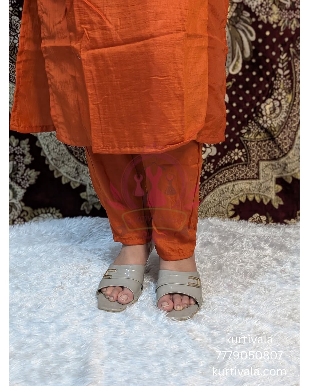 Step into elegance with this vibrant orange kurti set, beautifully adorned with intricate embroidery and paired with a matching dupatta. Perfect for festive occasions and celebrations, it blends traditional charm with modern style for a graceful look.
