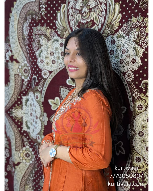 Step into elegance with this vibrant orange kurti set, beautifully adorned with intricate embroidery and paired with a matching dupatta. Perfect for festive occasions and celebrations, it blends traditional charm with modern style for a graceful look.