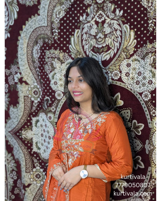 Step into elegance with this vibrant orange kurti set, beautifully adorned with intricate embroidery and paired with a matching dupatta. Perfect for festive occasions and celebrations, it blends traditional charm with modern style for a graceful look.