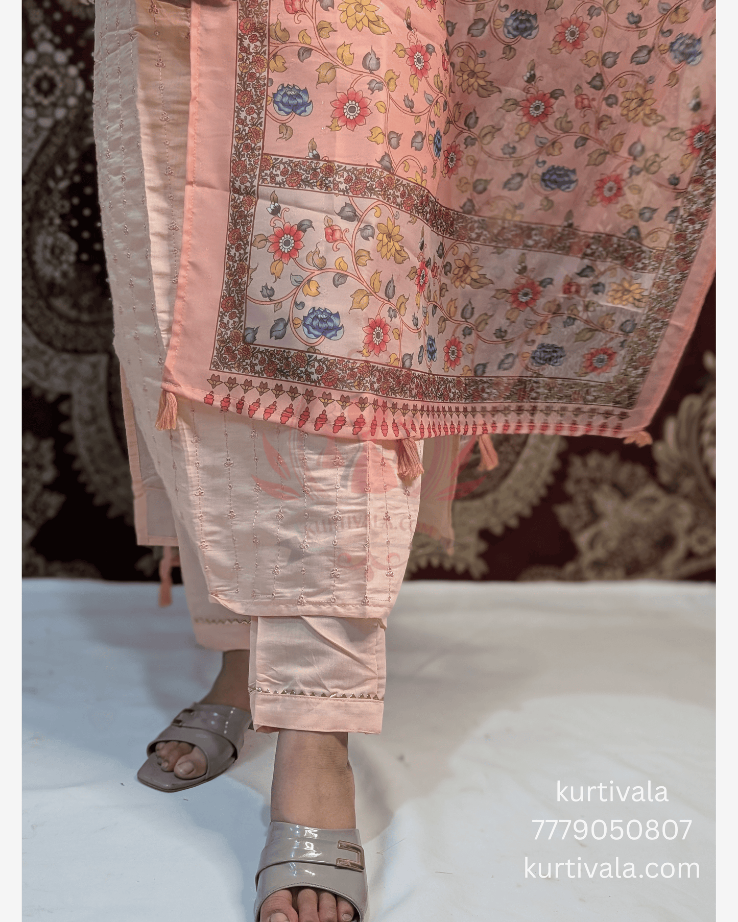 Add timeless elegance to your wardrobe with this peach kurti set featuring subtle embroidery and a vibrant floral dupatta. Perfect for festive occasions or casual outings, it offers both style and comfort. Shop now at