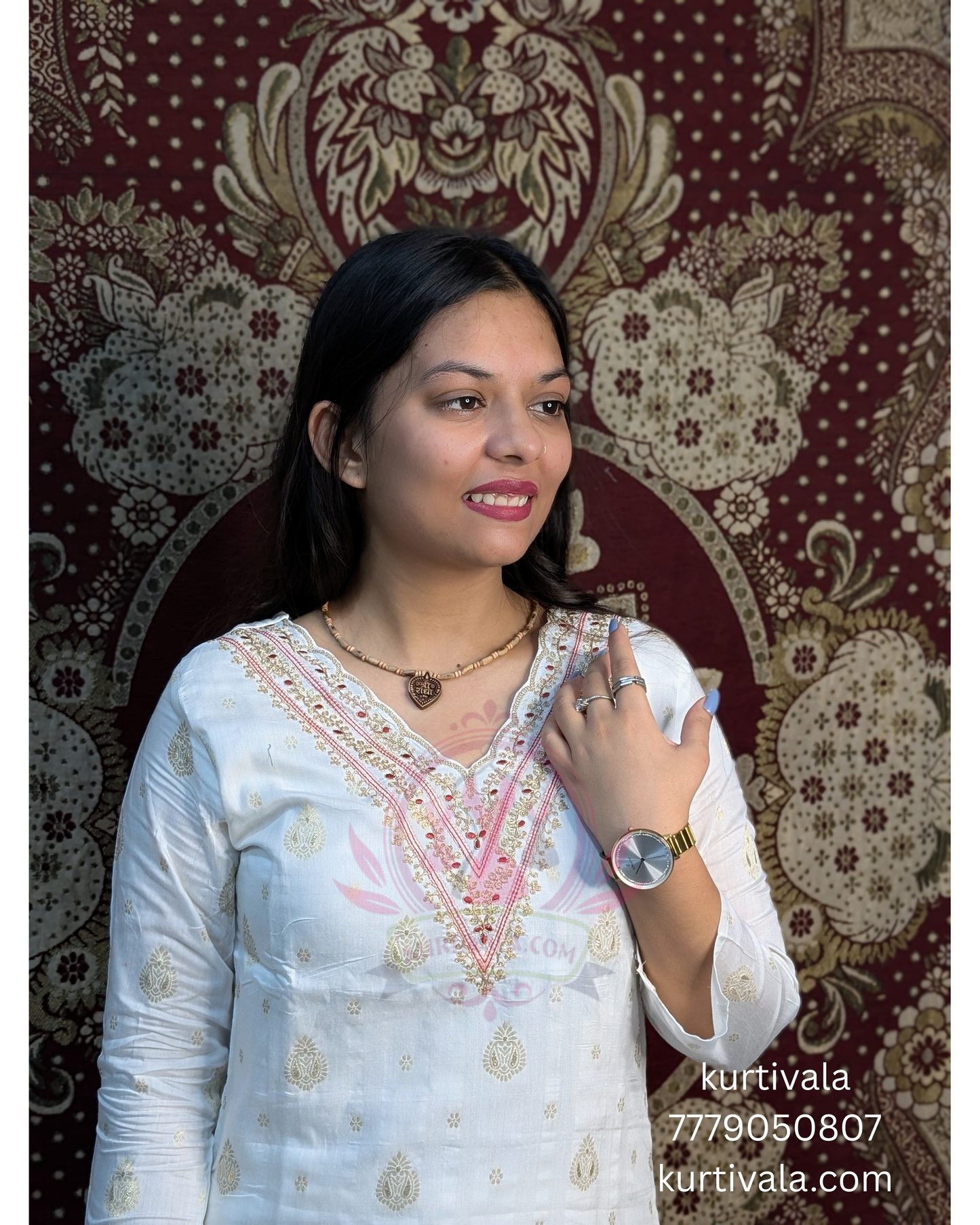 Radiate elegance in this white kurti set paired with a rich red Banarasi dupatta. Featuring delicate embroidery on the neckline and golden motifs on the dupatta, it's perfect for traditional functions, festive events, and graceful everyday wear