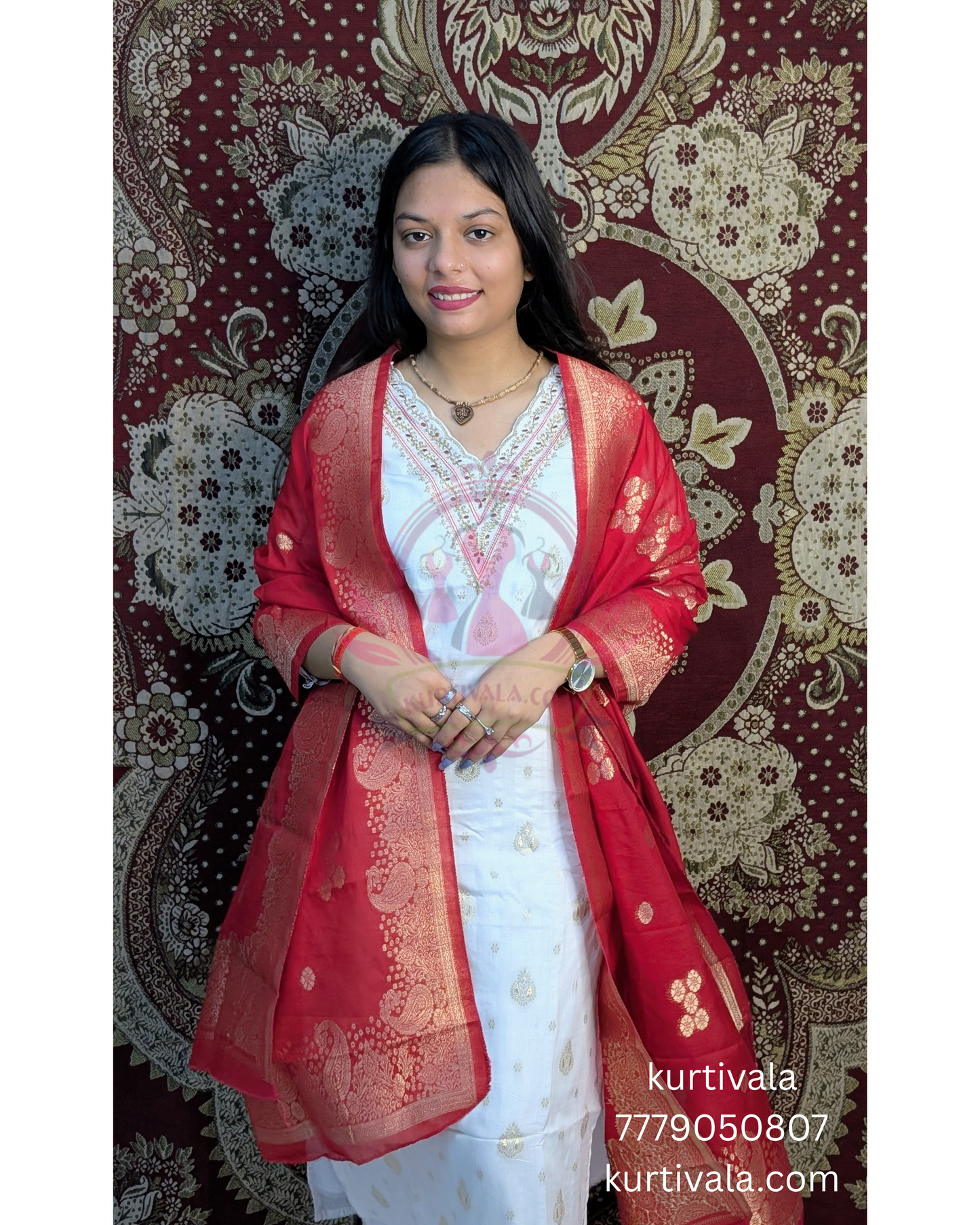 Radiate elegance in this white kurti set paired with a rich red Banarasi dupatta. Featuring delicate embroidery on the neckline and golden motifs on the dupatta, it's perfect for traditional functions, festive events, and graceful everyday wear