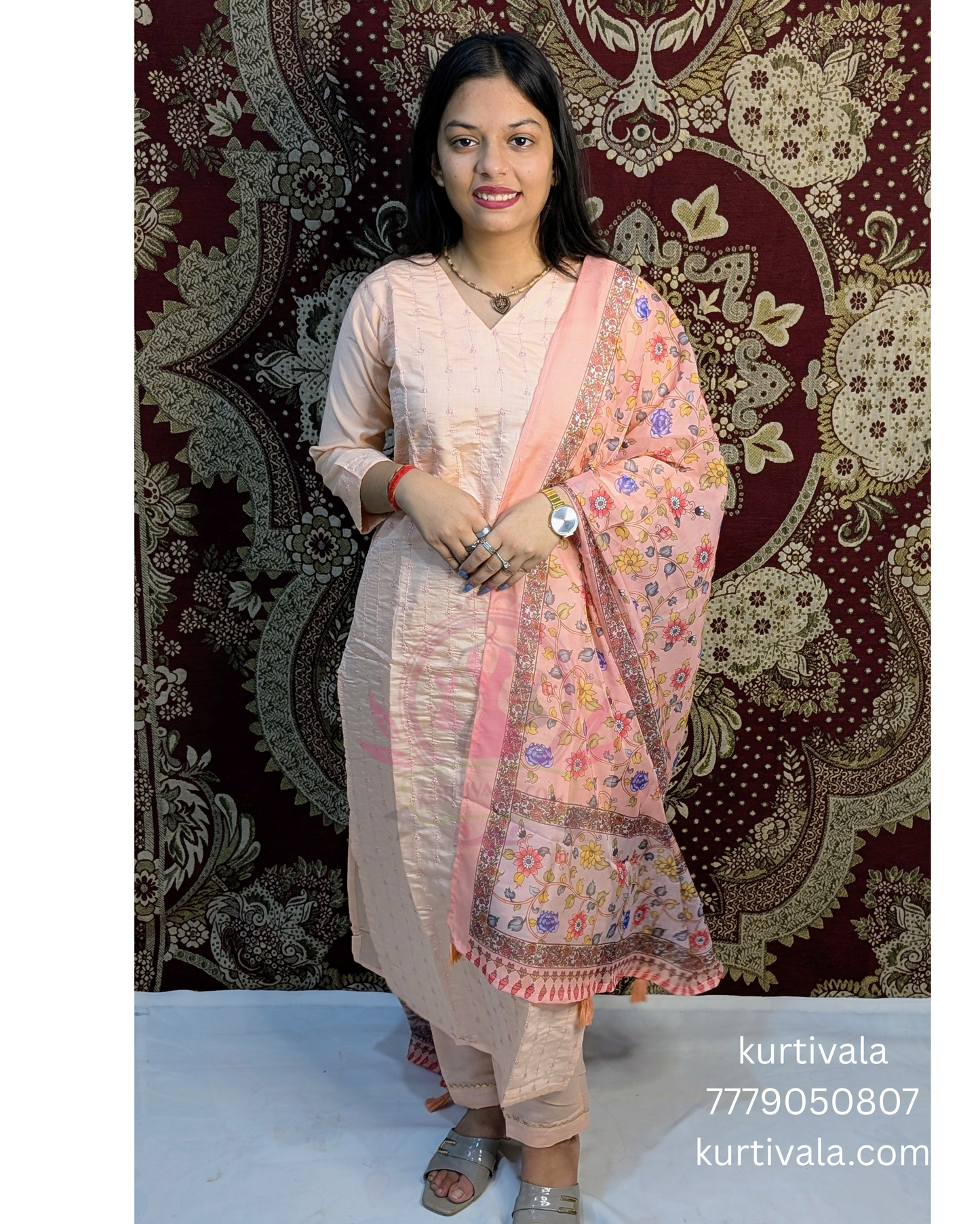 Add timeless elegance to your wardrobe with this peach kurti set featuring subtle embroidery and a vibrant floral dupatta. Perfect for festive occasions or casual outings, it offers both style and comfort. Shop now at