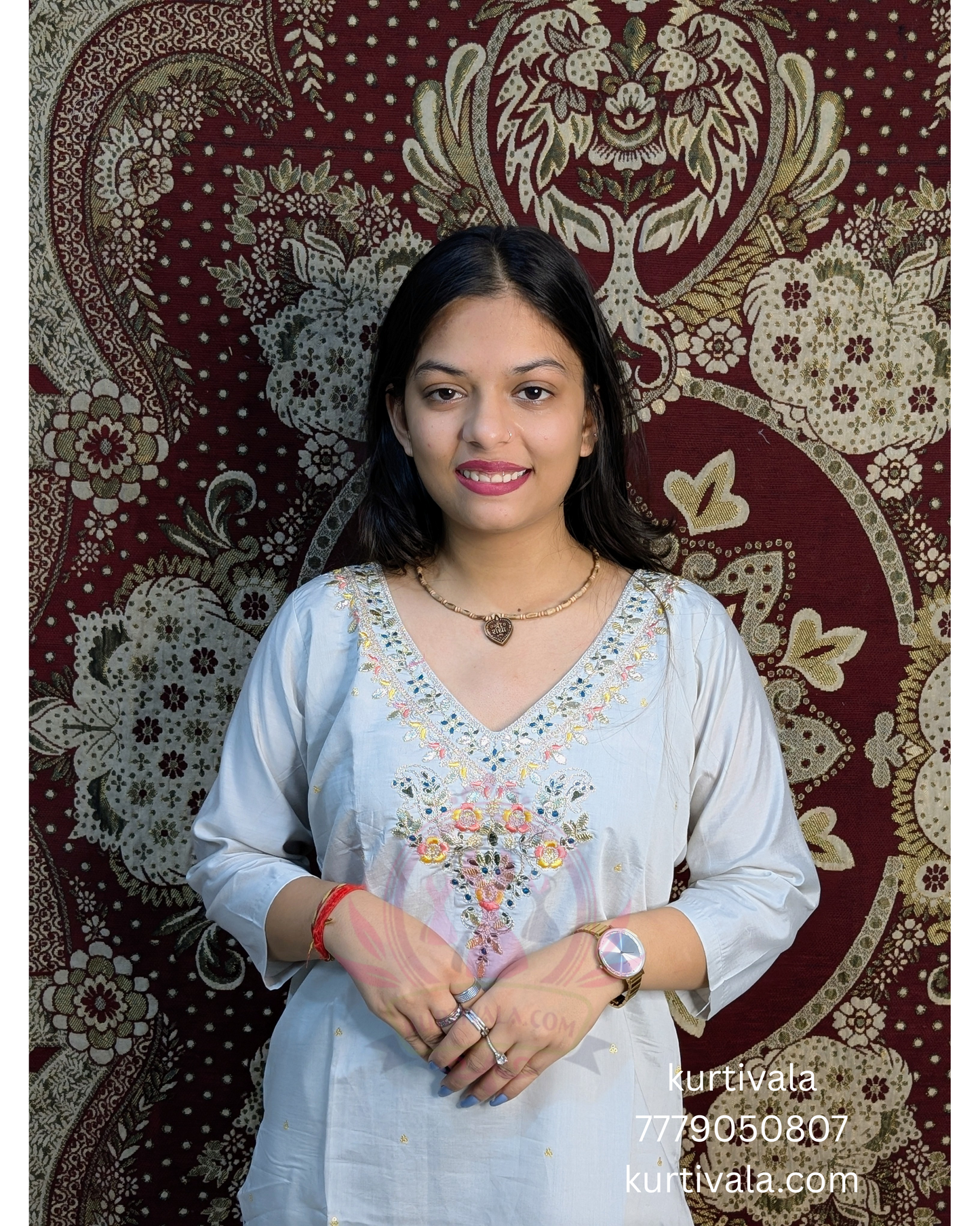This soft pastel kurti set brings grace and charm with delicate embroidery on the neckline and a vibrant floral dupatta with golden zari borders. Ideal for festive wear or special occasions, it blends elegance with comfort effortlessly