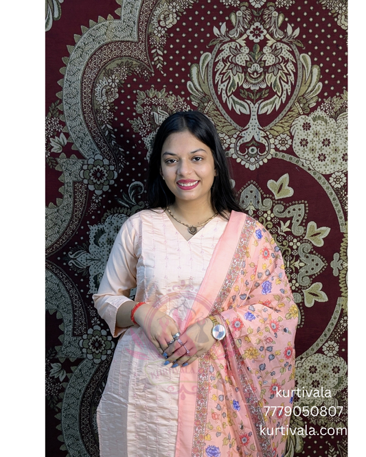 Add timeless elegance to your wardrobe with this peach kurti set featuring subtle embroidery and a vibrant floral dupatta. Perfect for festive occasions or casual outings, it offers both style and comfort. Shop now at
